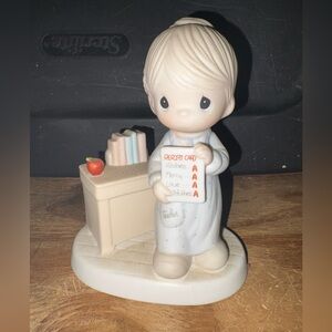 Precious Moments Porcelain Teacher Figurine. “Love Never Fails”.